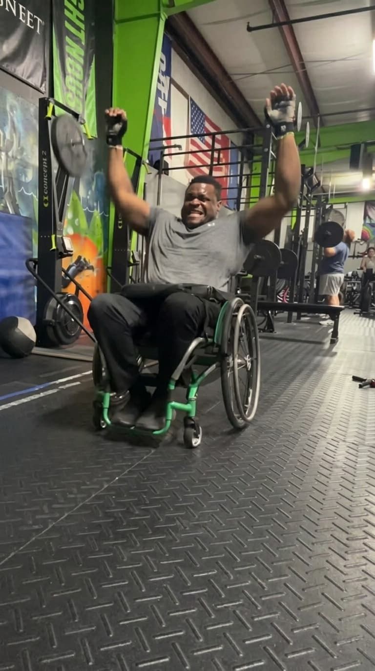 Adaptive athlete celebrating